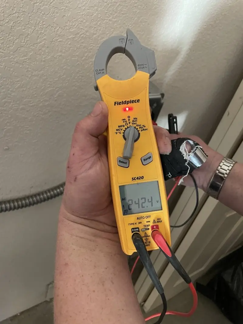 Voltage testing with clamp meter during Aluminum Wiring Replacement in North Little Rock